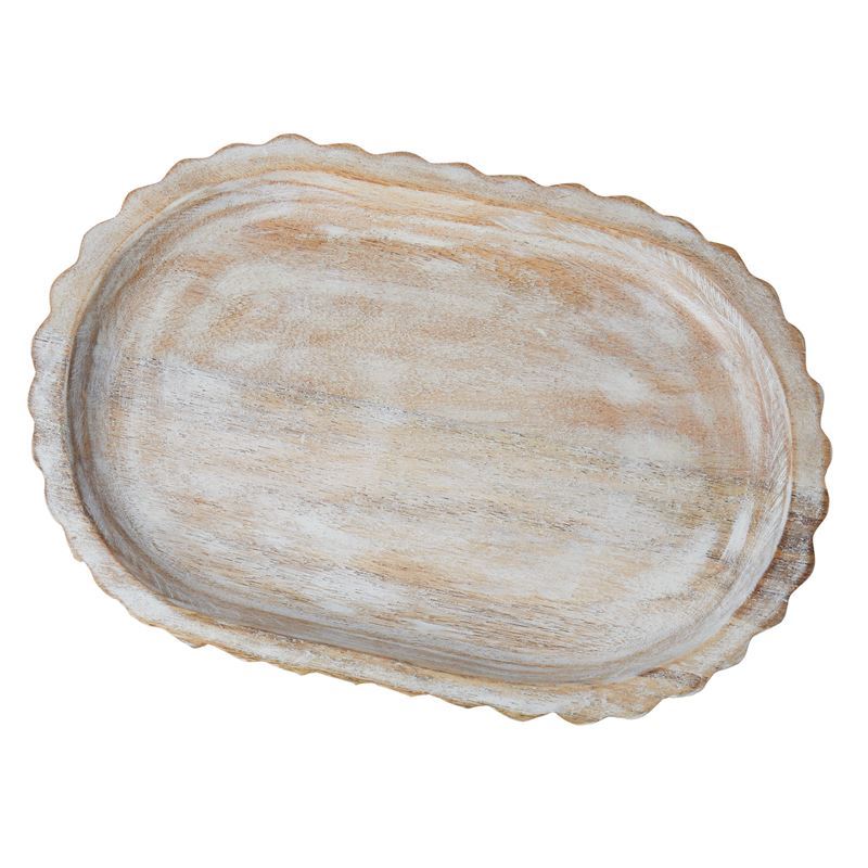 Amalfi - Ribbed Wood Decorative Tray
This image showcases a wooden oval-shaped decorative tray with a ribbed texture and a natural, warm-toned finish.